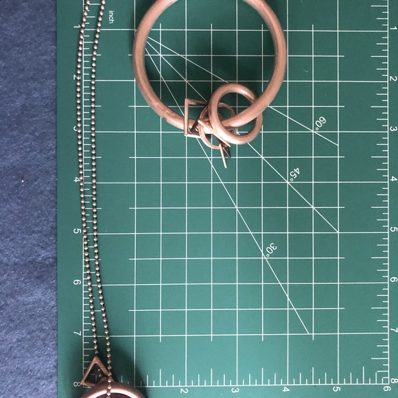 Necklace, earrings and bangle with free-floating geometric shapes as charms - Picture 4 of 12